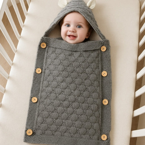 nid-d-ange-gris-chaud-pratique-pour-bebe